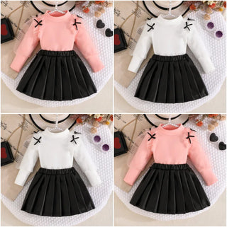 موضة 2025 جديد بنت ربيع وخريف طقم solid color knitted أكمام طويلة توب+solid color fashion قصير جيب 2-piece طقم