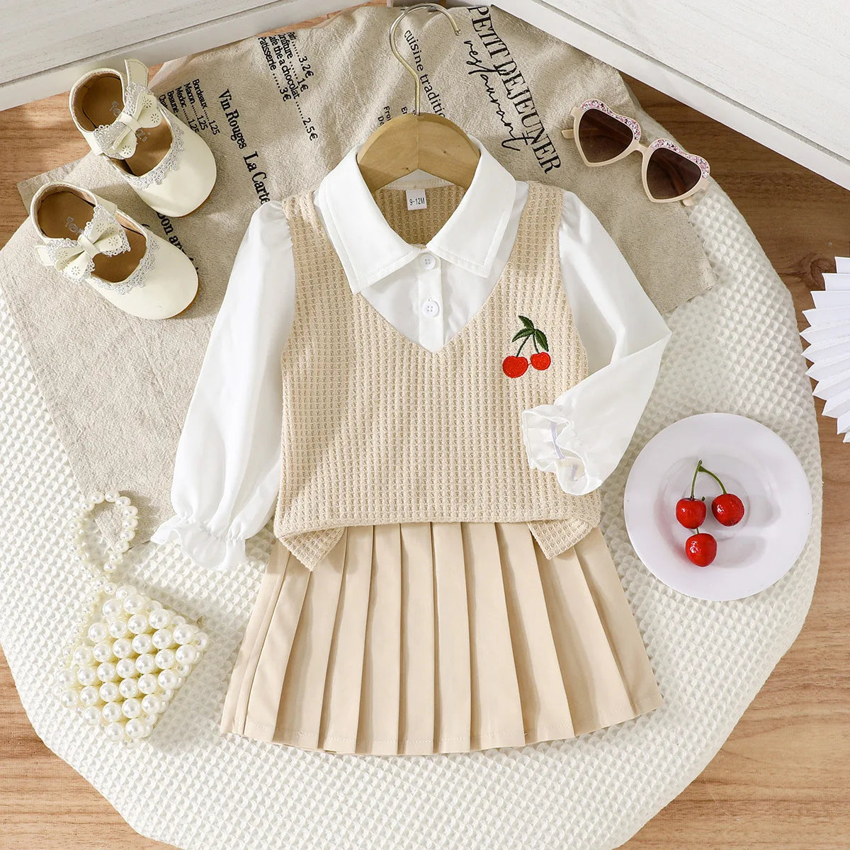 موضة 2025 ربيع وخريف جديد cherry pattern أكمام طويلة توب and بليسيه جيب 2-piece طقم