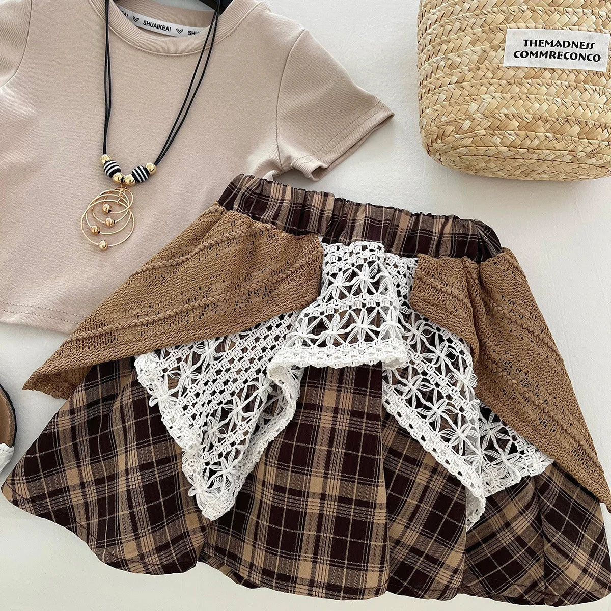 موضة 2025 صيف fashion بنات جديد joker أكمام قصيرة stitching plaid جيب طقم high quality cotton korean ستايل shirt