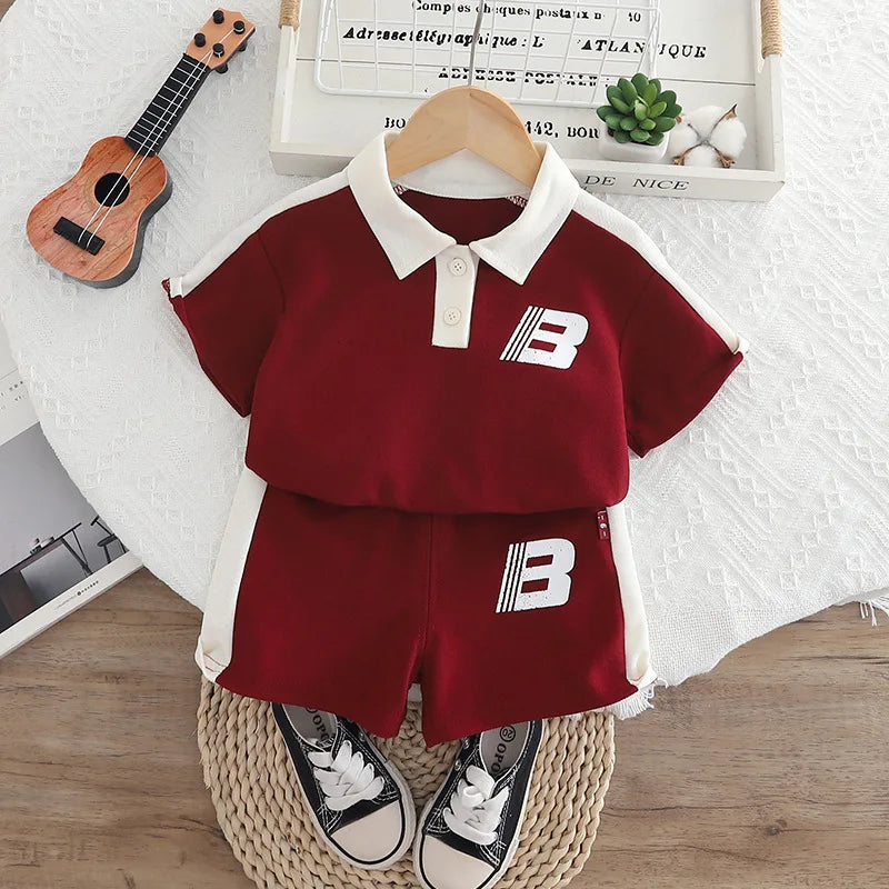 موضة 2025 جديد أولاد صيف two-piece كاجوال بدلة cotton أكمام قصيرة polo shirt and shorts with printed pattern for children